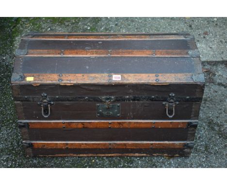 An old dome top trunk, 77cm long. 