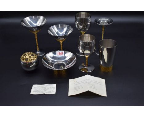 A set of Viners 'Stuart Devlin' stainless steel and gilt table wares, largest 18.5cm high. (8) 