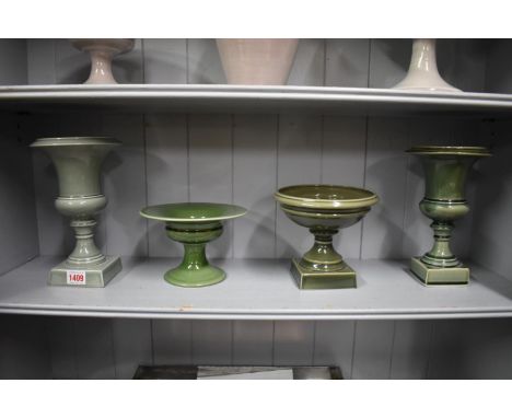 A Constance Spry pedestal urn, by Blakeney Pottery, 24cm high; together with another similar Constant Spry urn, by Humfrey Wa