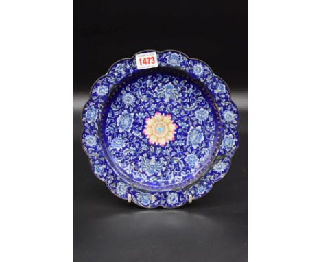 A Chinese Canton enamel dish,&nbsp;Qianlong, of shaped outline, 24cm diameter. 