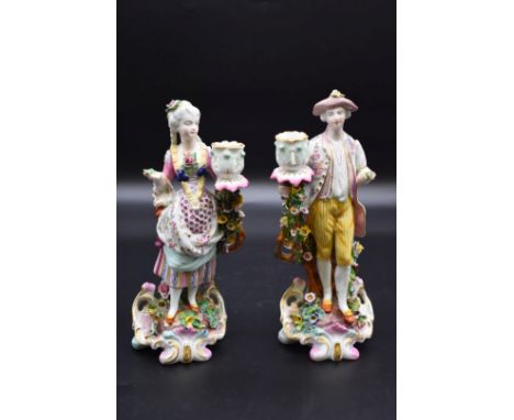 A pair of Meissen style candlestick figures,&nbsp;26cm high, (s.d).