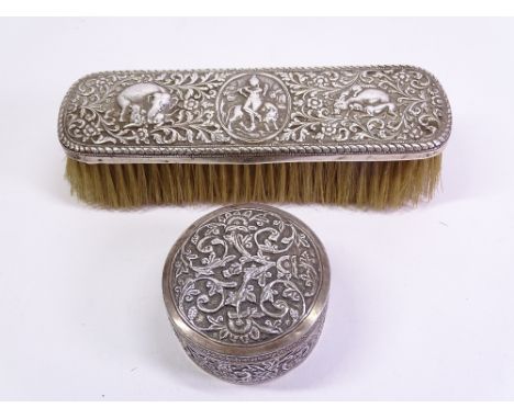 INDIAN BHUJ SILVER DRESSING TABLE BRUSH and similar circular lidded box, the brush stamped 'O M for Oomersi Mawji' late 19th 