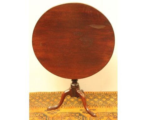 19th century circular mahogany snap-top table on turned pillar and tripod base, 76cm diameter.