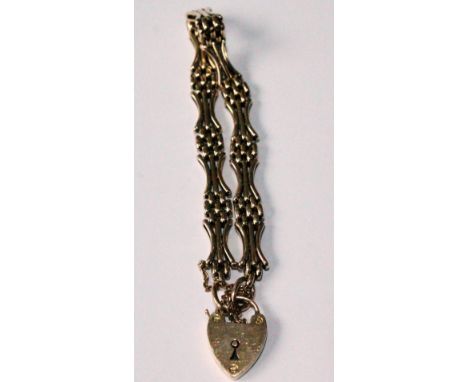 Gold gate bracelet with waisted links, '15'. Condition Report 16.9g
