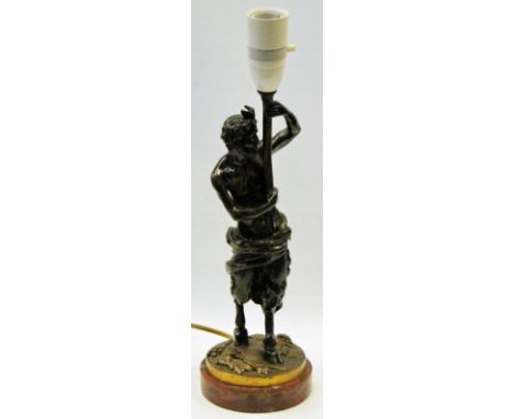 Bronze and brass satyr electric table lamp on rouge marble circular base, 35cm high.