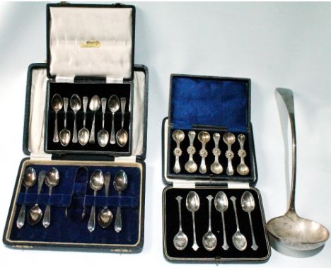 Set of six silver coffee spoons, various other cased spoons and a soup ladle.