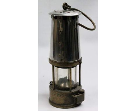 Miner's brass, steel and glass safety lamp (no. 24), with hook handle to the top, 25cm high.