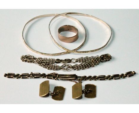 Two gold slave bangles, '10K', a band ring with a small diamond, a watch bracelet, a pair of cufflinks and a gold bracelet wi