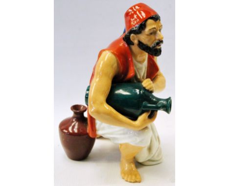 Royal Worcester figure, 'Algerian Water Carrier', modelled by James Hadley, 1877, 15cm high.