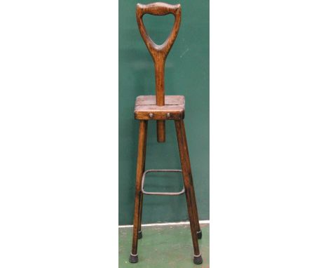 Walking stick carving stand.