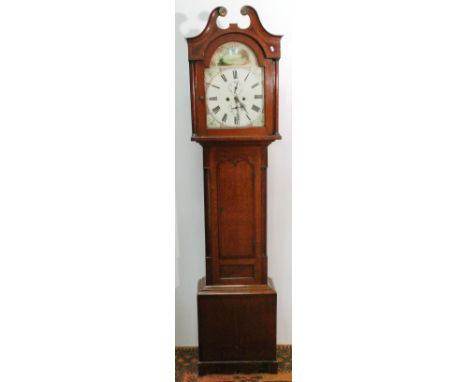 Eight day longcase clock with 13¼in dial painted with a landscape in the arch, in oak and mahogany case with scroll cresting.