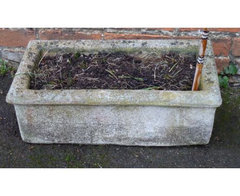 A reconstituted stone garden planter, of rectangular form