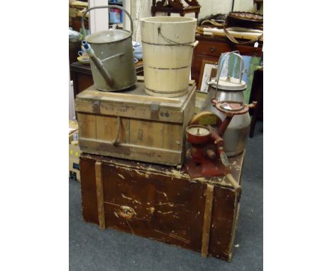 A vintage ball bearing driven cream separator, a 19th century wooden cabin trunk, a munitions box, a galvanised water can, a 