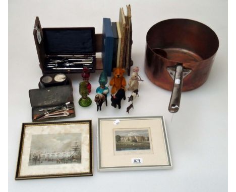 A large Victorian copper saucepan, with steel handle, together with a small quantity of plush toys, three miniature paraffin 