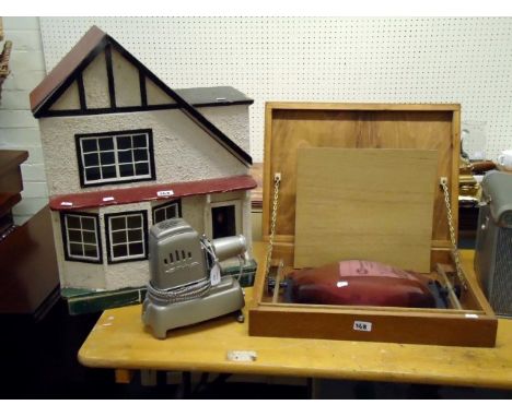 A cased Aldis projector, together with an oak cased Lumex adjustable convex magnifying lens and a circa 1950s timber construc