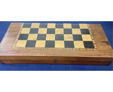 Chess set in old box, the box if probably Victorian but pieces are 20th Century, red and white