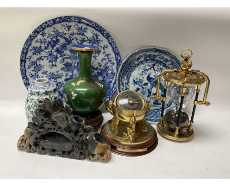 A selection of Chinese items including a soapstone carving, together with a gilt brass sand timer and a copy of a maritime sh