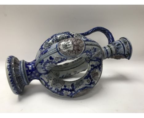A German Westerwald pottery pitcher.