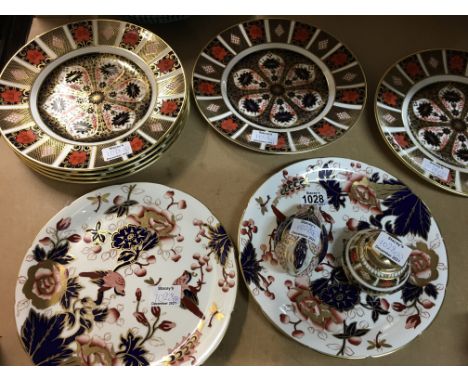 A Collection of six Royal crown derby plates and paperweight and lighter.
