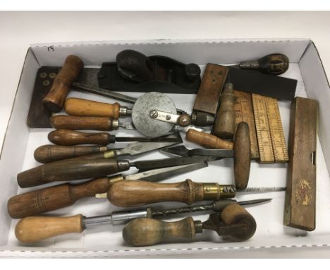 A collection of various vintage woodworking tools.