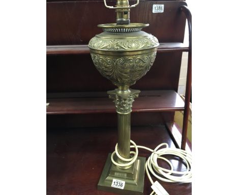 A Victorian brass oil lamp with a Corinthian column base - NO RESERVE