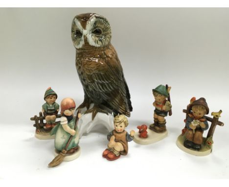 A large German ceramic owl and a Collection of Goebel figures.