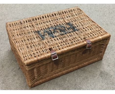 A wicker F&amp;M Hamper basket