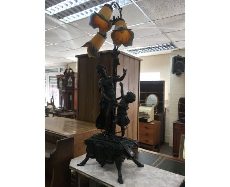 A classical style lamp Of two figures on base with three shades