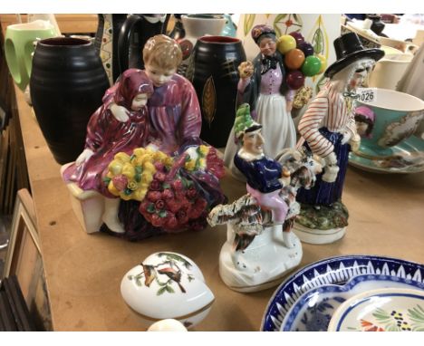 A Collection of ceramics comprising Doulton figures Staffordshire figures, Royal Worcester candle snuffers .
