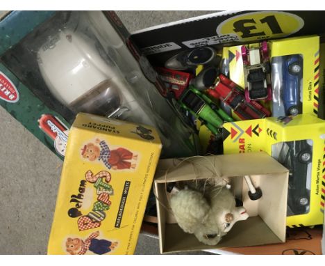 A box containing toys including boxed Maisto cars, a Pelham puppet and a Britains Collectables Jaguar boxed