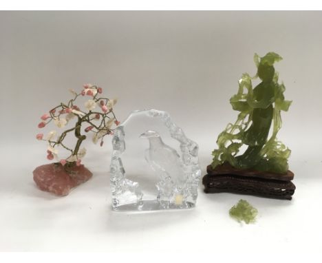 A 20th Century jade figure (a/f), a Swedish Royal Krona glass ornament and a rock crystal tree (3).