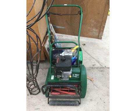 A SUFFLOK PUNCH CYLINDER PETROL MOWER (KAWASAKI ENGINE) WITH GRASS BOX IN WORKING ORDER 