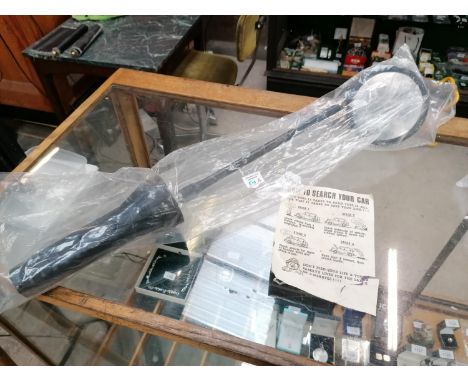 AN INSPECTION TORCH AND LEAFLET 