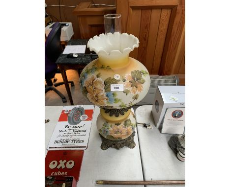A VINTAGE GLASS HAND PAINTED OIL LAMP 