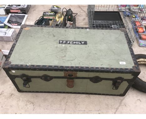 A VINTAGE TRAVEL TRUNK WITH INNER TRAY AND LEATHER CARRY STRAPS 