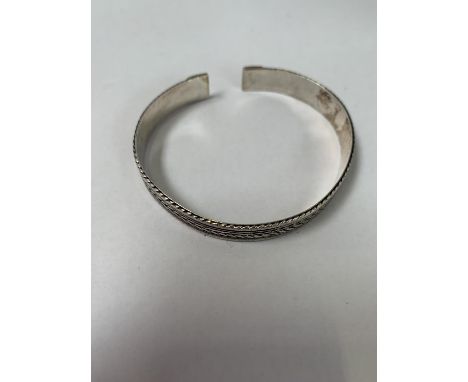 A SILVER BANGLE 