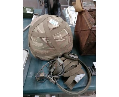 A VINTAGE BRITISH ARMY HELMET AND HEADSET (2) 