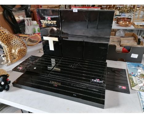 A LARGE TISSOT WATCH DISPLAY STAND 