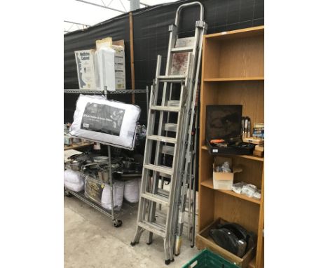 THREE SETS OF ALUMINIUM LADDERS TO INCLUDE AN ELEVEN RUNG TWO SECTION, A FOURTEEN RUNG TWO SECTION AND A SIX RUNG STEP LADDER