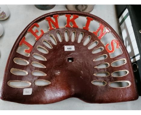 A CAST IRON JENKINS TRACTOR SEAT 