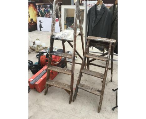 TWO SETS OF FOUR RUNG VINTAGE WOODEN STEP LADDERS 