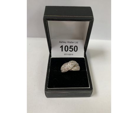 A MULTI-STONE RING , BOXED 