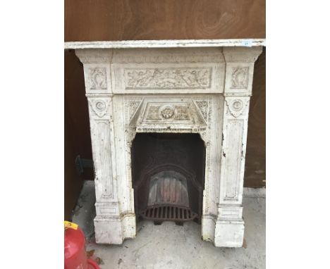 A WHITE PAINTED ORNATE CAST IRON FIRE PLACE WITH BACK AND GRATE 