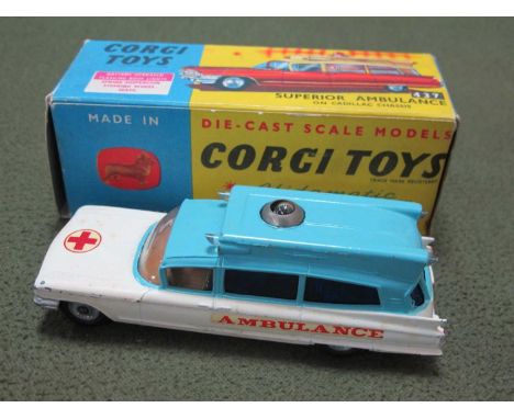 A boxed Corgi diecast model 437 Superior Ambulance on Cadillac Chassis, light blue over white body, Ambulance decals on both 