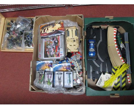 A varied collection of toys to include Scalextric, Lego, Mega Bloks, Eaglemoss DC white metal model super hero figures, plus 