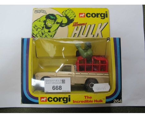 A boxed Corgi 264 The Incredible Hulk diecast model Mazda Pick-Up, light metallic brown, black interior, red cage with The In