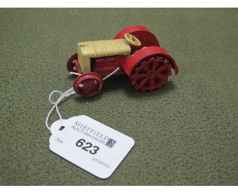 A 1930s Pre War Dinky 22e Farm tractor, red/cream. all original seat and tow hook intact, overall very good for age, little p