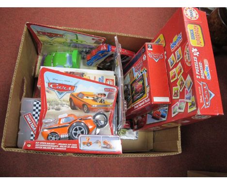 A collection of toys and games relating to the Disney Pixar film Cars to include, jigsaw puzzles, Vtech learning game, Snot R