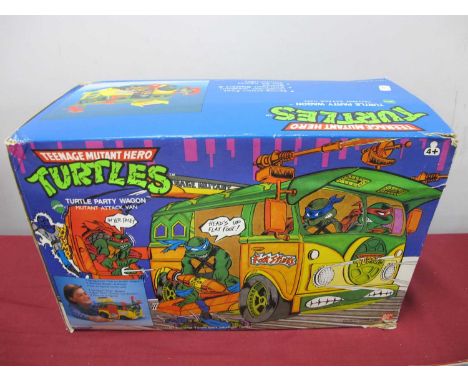 A Bandai Playmates Teenage Mutant Hero Turtles Turtle Party Wagon Mutant Attack Van, small parts may be missing, instruction 