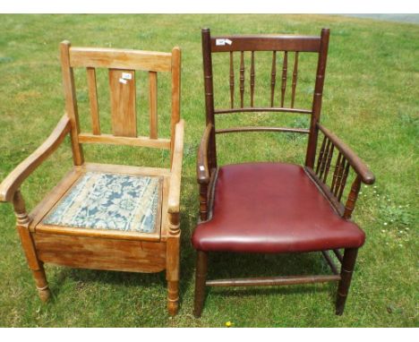 A good quality oak occasional chair with leather seat and pressed stud detailing and a commode with hinged lid containing cer